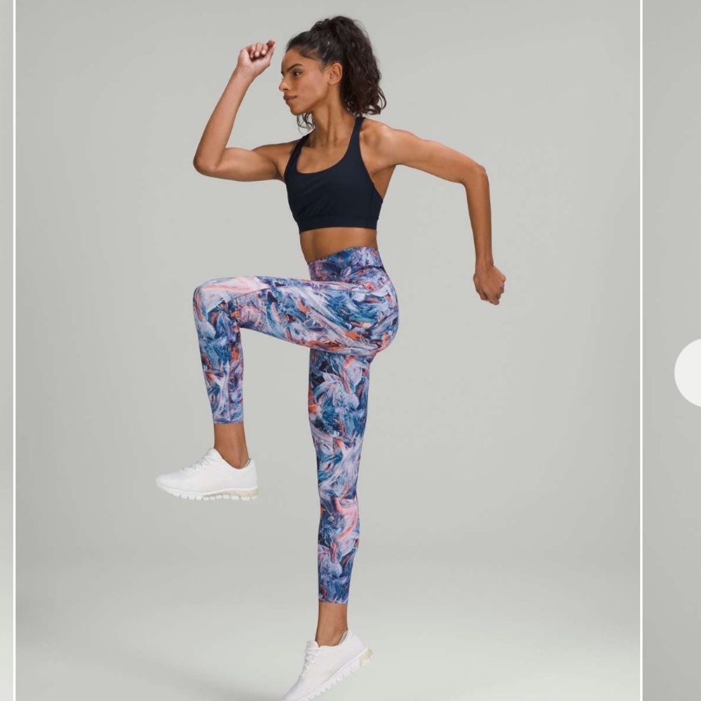 Lululemon Base Pace High-Rise Running Tight 25"
Atmospheric Purple Multi size 6